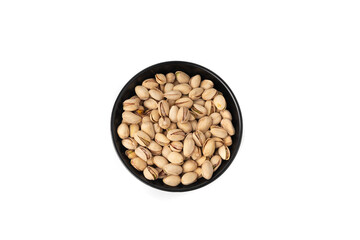 Fried salt pistachio nuts isolated. Baked pistachios pile, roasted green pistache fruit in shell on white