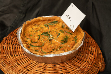 Round pie with herbs and vegetables