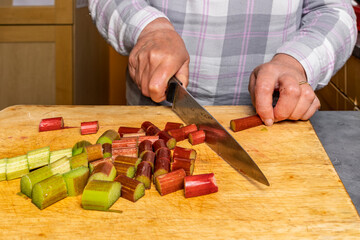 Chopping Rhubarb on a Wooden Block