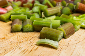 Close-Up of Chopped Fresh Rhubarb Prepped on Wooden Chopping Board