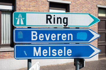 Obraz premium Road sign to the ring of Antwerp and the cities of Melsele and Beveren in Kallo, East Flanders, Belgium