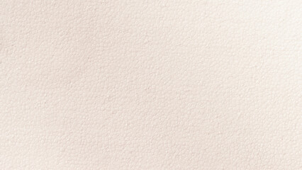 Light beige styrofoam texture with small hexagonal pattern in macro view, soft focus. Concept of...