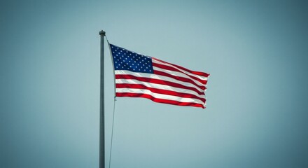 A vibrant red, white, and blue pinwheel spins against a bright, clear white background.