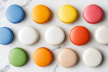 Obraz premium Colorful macarons on marble background for bakery and dessert marketing
