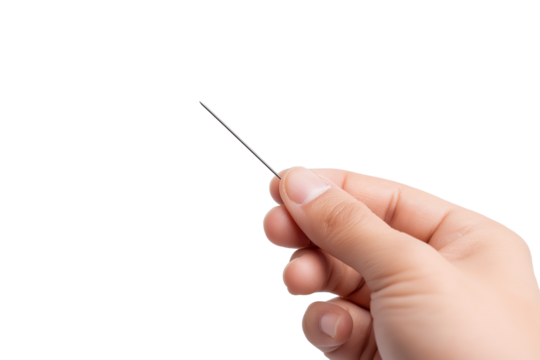 hand delicately holding needle isolated on white background