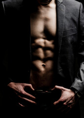 A gangster holding a gun.