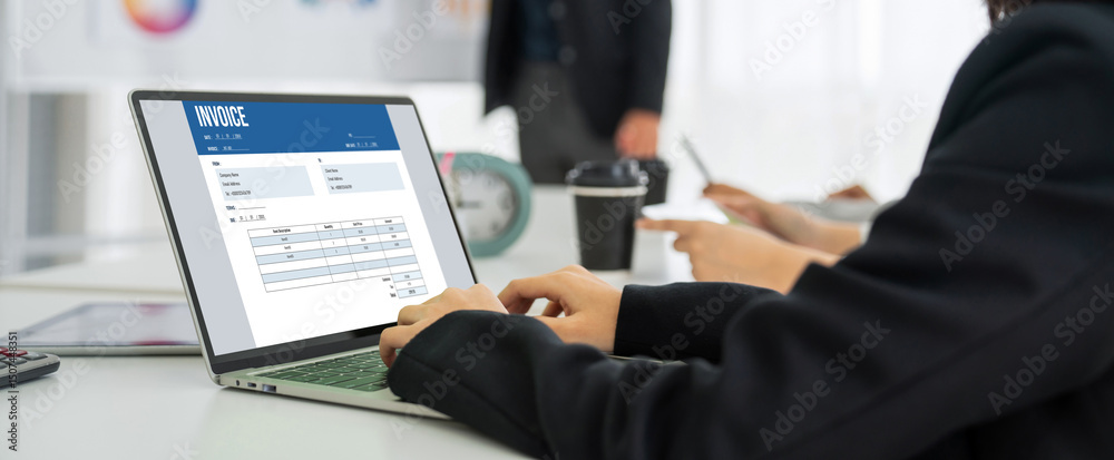 Poster invoice on computer screen from accounting application. computer program for financial and budget of
