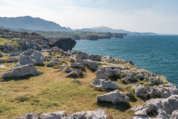 Rocky coastline near the Ermita de San Antonio church, in Asturias, along the coast of northern Spain