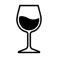 Wine glass filled with dark liquid