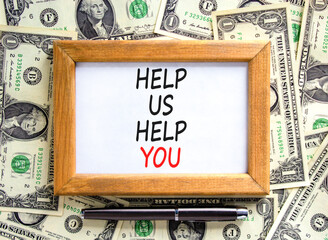 Help you symbol. Concept words phrase Help us help you on beautiful wooden picture frame. Dollar...
