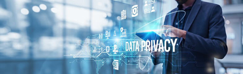 Businessman using tablet analyzing data privacy and software market growth driven by rising regulatory demands, increasing cyber threats, and widespread adoption of privacy-enhancing technologies.