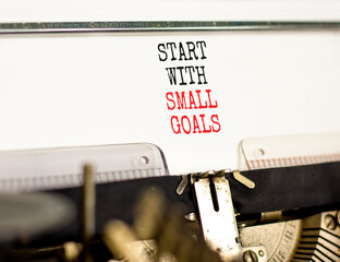 Start with small goals symbol. Concept words phrase Start with small goals typed on beautiful retro...