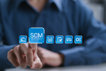 SCM, supply chain management concept. Logistic and transport, organizing and controlling resources to meet the needs of customers. Businessman touching to virtual SCM icon,
