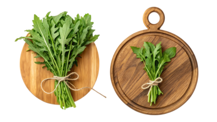 Fresh arugula bundles on wooden cutting boards on transparent background