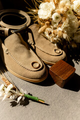 Wedding details, shoes, wedding bouquet, gold rings, boutonniere 