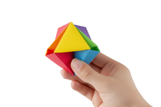 colorful geometric puzzle in hand isolated on white background