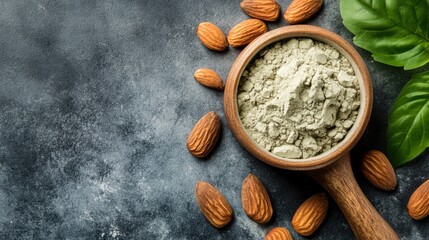 Fototapeta premium Scoop of plant-based protein powder with fresh almond