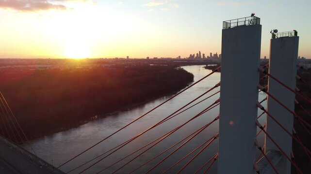 large cable bridge during sunset