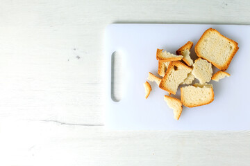 Bread biscuits on a kitchen board