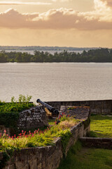 Blaye, Bordeaux region, France, sunset over the Gironde estuary with citadel fortress in the foreground, peaceful and colorful summer evening