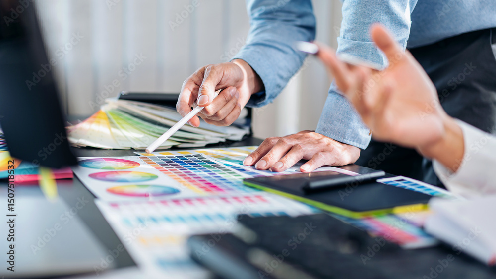 Leinwandbilder two creative graphic designer team working on color selection and drawing on graphic tablet, color s