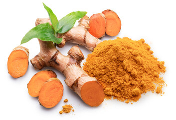 Turmeric rhizome slices, turmeric powder and green leaves on white background. File contains clipping path.