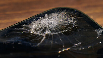 A broken phone screen. Cracks in the display