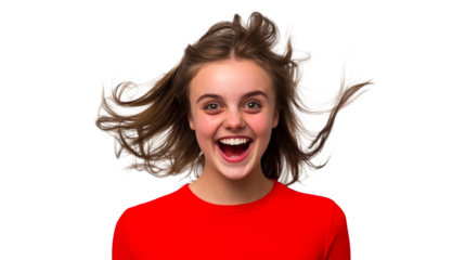 Excited young girl with windblown hair looking at camera, cut out transparent