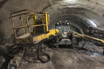 view of an excavator with a platform used in tunnel excavation