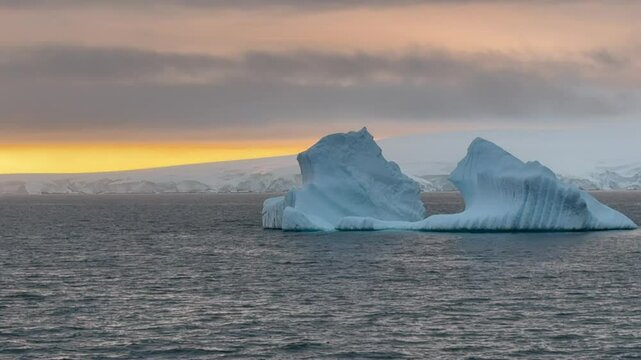 Big Iceberg in Antarctica Winter Scenery, Amazing Shape Ice Formation of Massive Large Enormous Blue Icebergs in Antarctic Peninsula Landscape Seascape with Ocean Sea Water