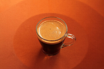 Concept, natural coffee beans are colored red, coffee seeds symbolize energy and vigor