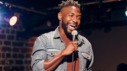 stand-up comedian performing on stage with microphone