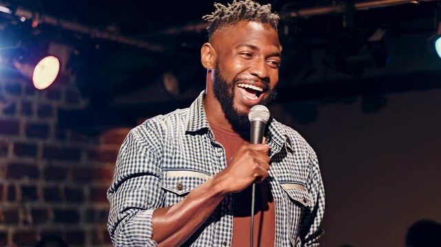 stand-up comedian performing on stage with microphone
