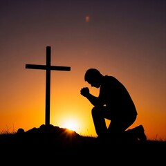 Man Praying To God's Light. Silhouette Of A Man Kneeling In Prayer