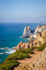 Summer view of Cabo da Roca cliffs and Atlantic Ocean, Portugal. Cabo da Roca is a western point of Europe