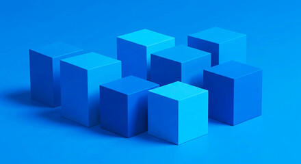 Obraz premium A minimalist arrangement of eight blue cubes in varying shades on a blue background surface studio shot