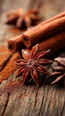 Spices Arranged on Rustic Wood Surface Showing Cinnamon Sticks and Star Anise in Warm Light