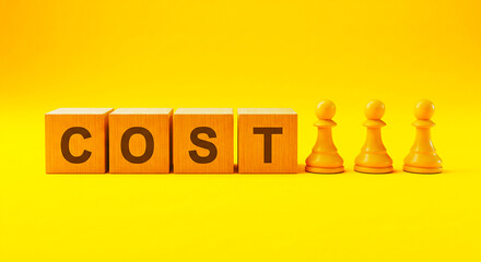 Wooden blocks spelling cost and three chess pawns on a yellow background in a studio setting
