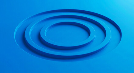 Three concentric circles carved into a solid blue surface with soft lighting and subtle shadows