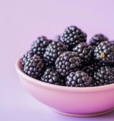 Juicy Blackberries in a Pastel Pink Bowl: A Serene Still Life