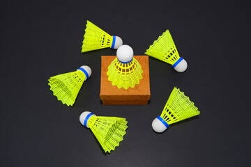 badminton rackets on black background close-up view group objects sports accessories concept 