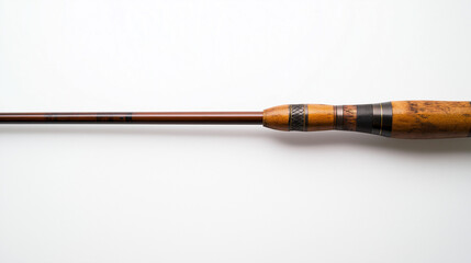 Fototapeta premium A fishing rod on a white background, showing its long, slender pole, attached reel, and line guides designed for casting and reeling in fish.