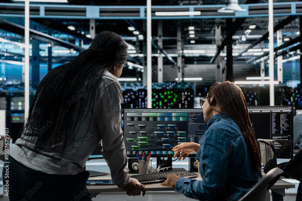 Poster server room manager overseeing work done by engineer using artificial intelligence to reduce downtim