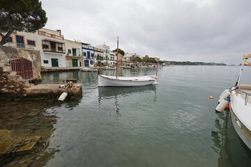 Fototapeta premium Traditional llaüt boat moored in portocolom, mallorca, spain