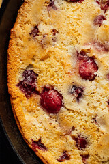 cherry clafoutis in cast iron pan