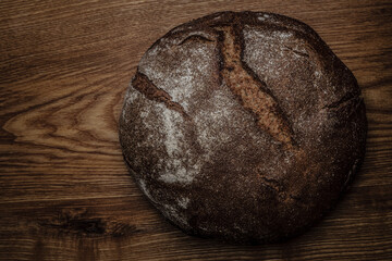 Rye bread on wooden table