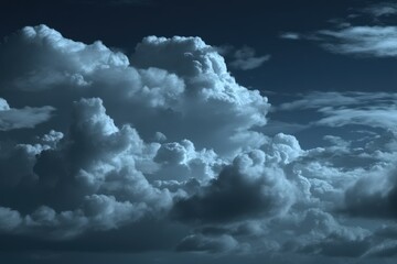 Obraz premium Dramatic Night Sky With Fluffy Clouds