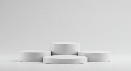 Four white round podiums isolated on white background for product display