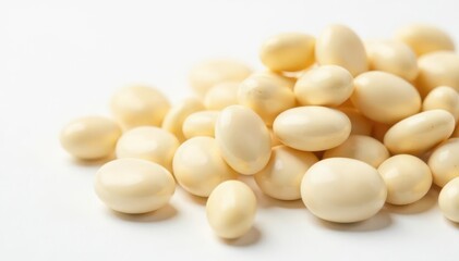 Close-up of white beans on pristine white background, food, legumes, seeds