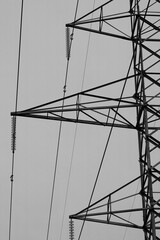 High-Voltage Power Transmission Tower in Black and White